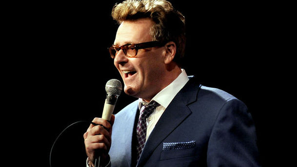 Logo for Greg Proops - Back in the UK